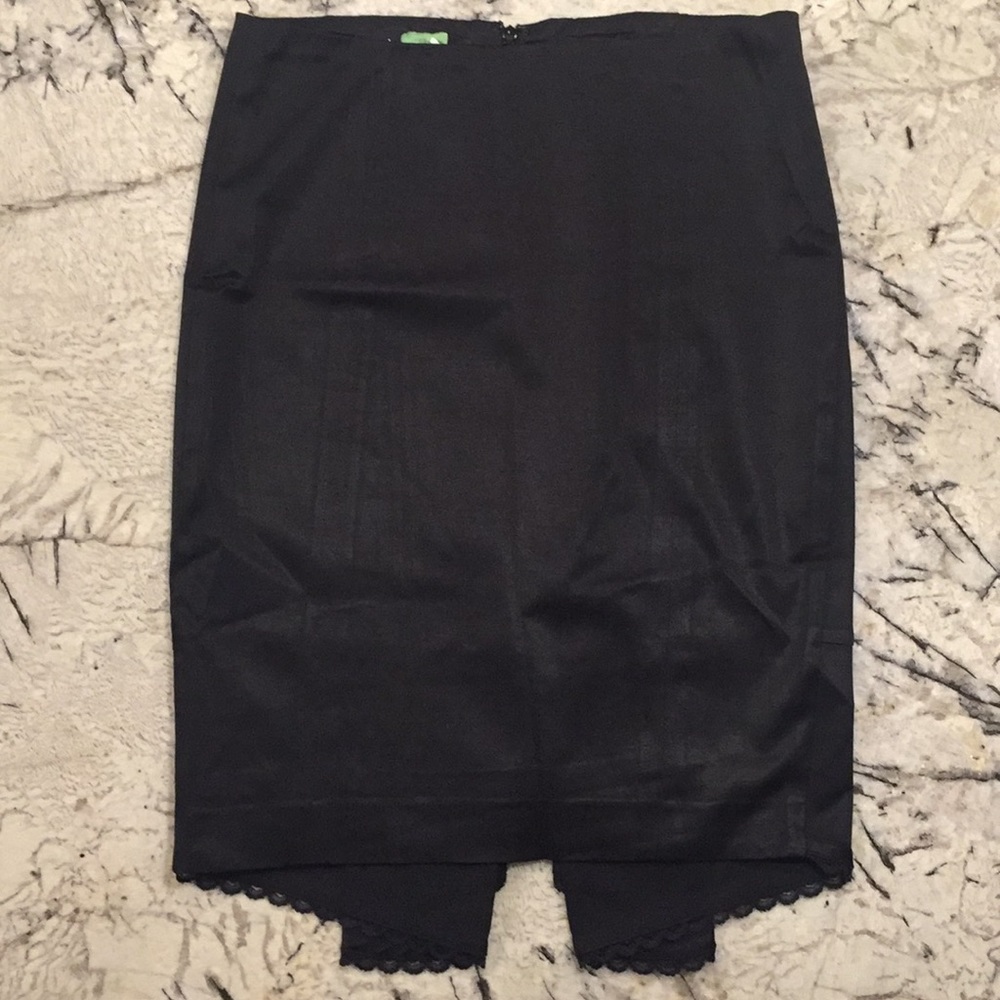 Knee length pencil skirt with kick pleat